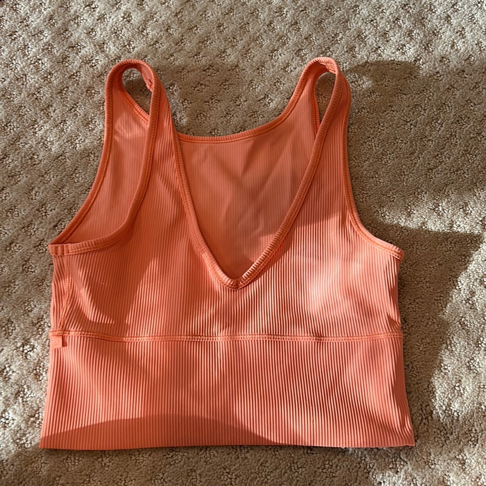 Orange Lululemon power pivot tank